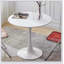 Table de salle à manger ronde blanche moderne avec plateau en panneau de fibres à densité moyenne et base en acier, idéale pour les petits espaces et la vie contemporaine-707798837-707798986-707798833