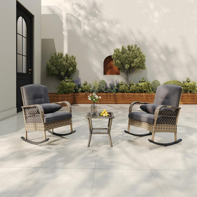 Chaise berçante d'extérieur en osier, chaise berçante de patio en rotin avec coussins et structure en acier, mobilier berçant en osier pour la cour de jardin