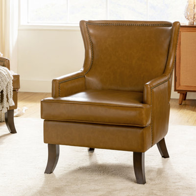 Fauteuil à oreilles en cuir Aquita