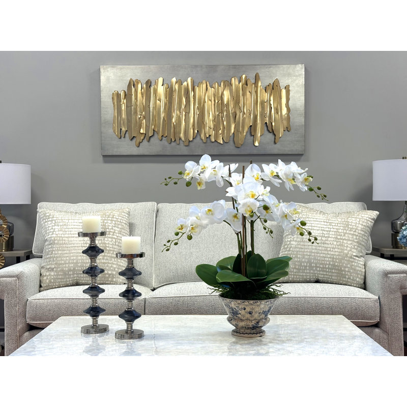 Traditional Orchid Floral Arrangement in a Decorative Ceramic Vase