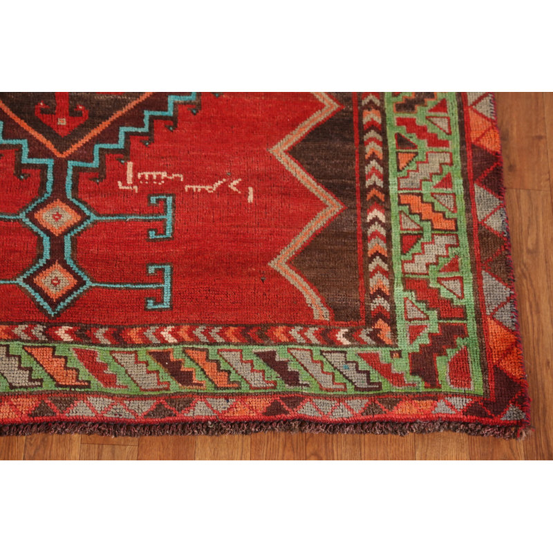 Tapis traditionnel rouge à motif géométrique 5 x 9