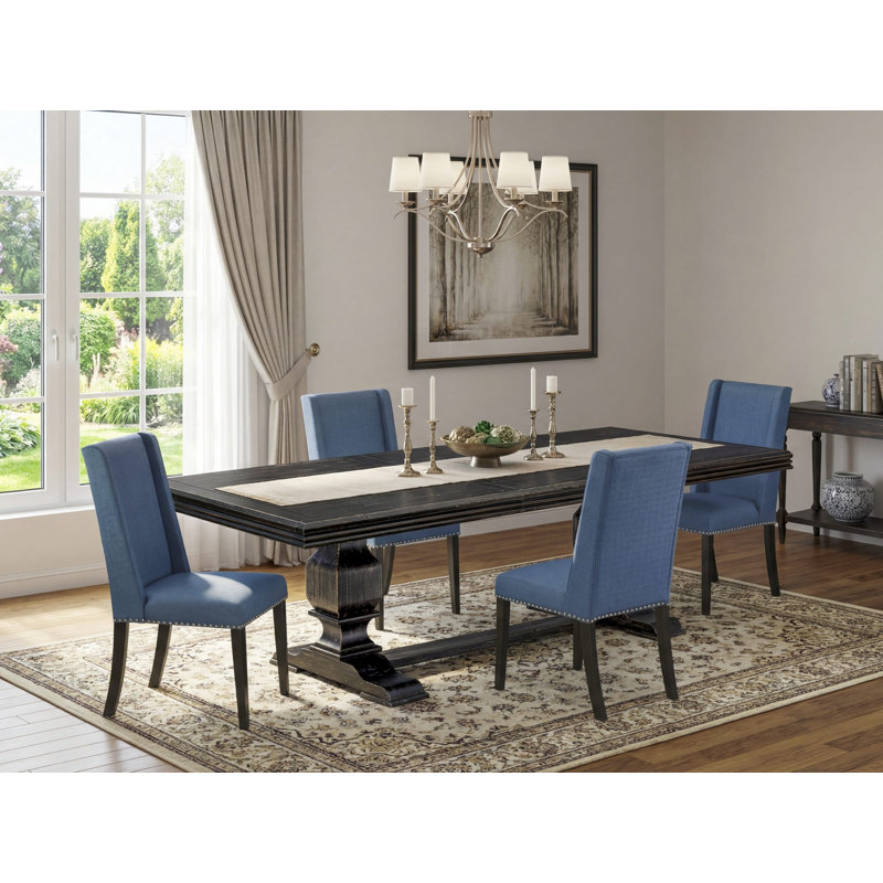 L'ensemble de salle à manger 5 pièces se compose d'une table en bois et de 4 chaises de cuisine en tissu de lin bleu minéral avec dossier rembourré - fini noir sablé