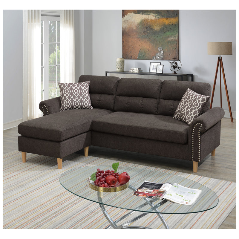 Canapé d'angle réversible en L avec accoudoirs arrondis et coussins décoratifs en velours beige