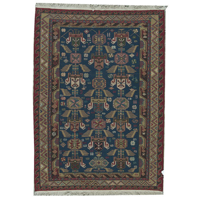 Tapis bleu et ivoire de haute qualité noué à la main