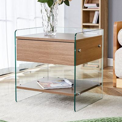 Bedside Table With Drawers. The Board Surface Is MDF Sticker, And Both Sides Are Transparent Tempered Glass. The Design Is Simple And Elegant, With Excellent Storage Functions.