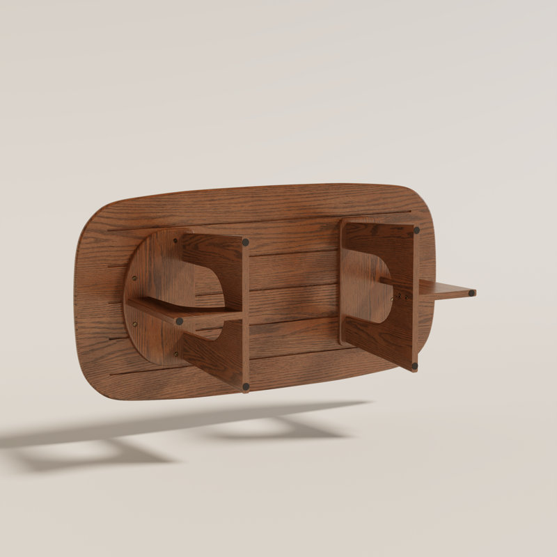 Table basse ovale moderne du milieu du siècle avec pieds piédestal arqués ajourés
