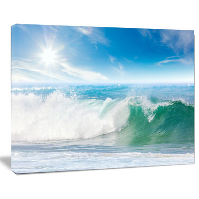 'White and Blue Waves under Sun Seashore' Photographic Print on Wrapped Canvas