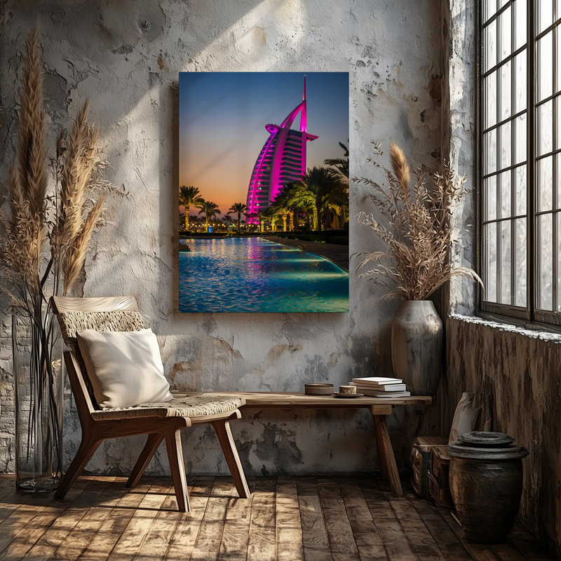 Toile, une superbe scène au crépuscule avec l'art mural emblématique Burj Al Arab à Dubaï illuminé avec des lumières roses vives