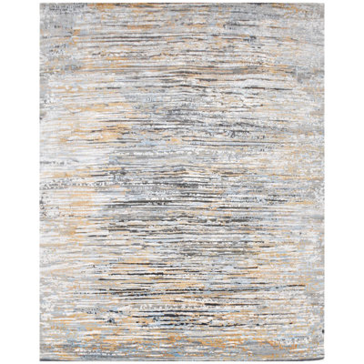 Tapis brun luxueux noué à la main