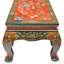 Table basse à quatre pieds