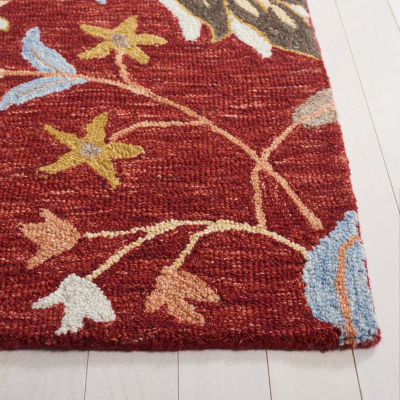 Handmade Red and Orange Floral Wool Area Rug, 5' x 8'