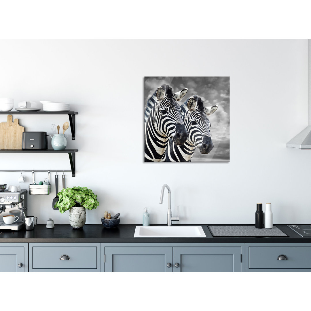 Glasbild Zwei Zebras