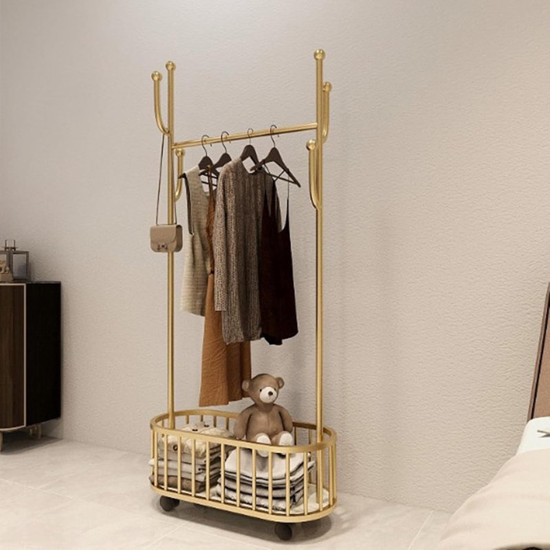 Portant à vêtements 32 po en métal doré avec roues verrouillables et panier de rangement inférieur, idéal pour un usage domestique et commercial dans le couloir, la chambre à coucher, le salon, le balcon, le bureau