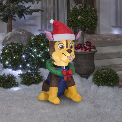 Chasse de Noël gonflable en forme de patte de Noël avec chapeau de père Noël