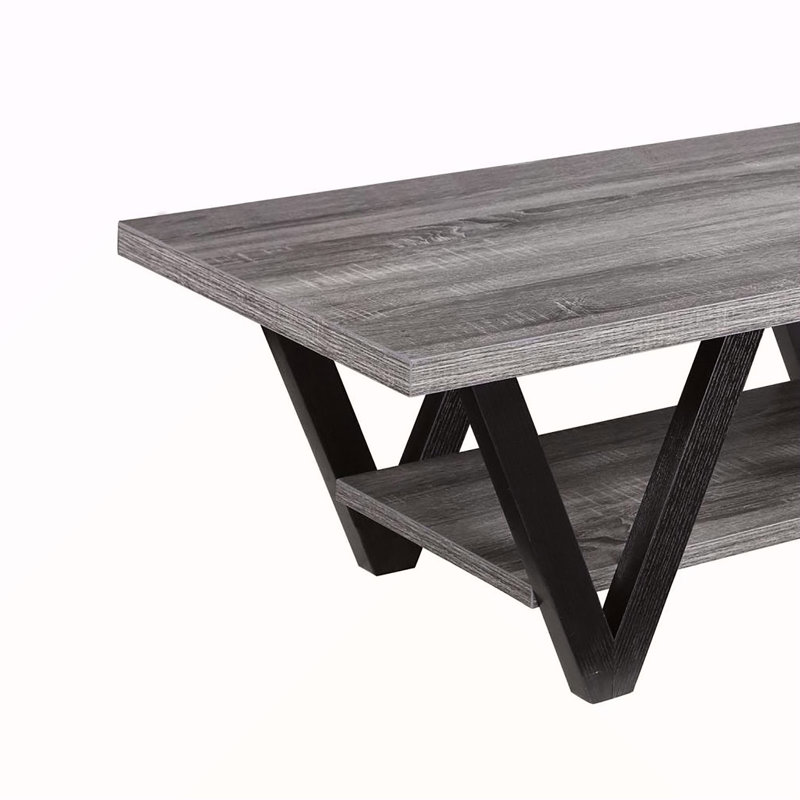 Table basse à pieds noirs et gris