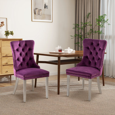 Chaise rembourrée capitonnée