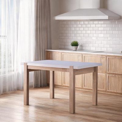 Modern farmhouse dining table with spacious tabletop warm natural and clean white finish seats 4 guests comfortably in kitchen or breakfast room