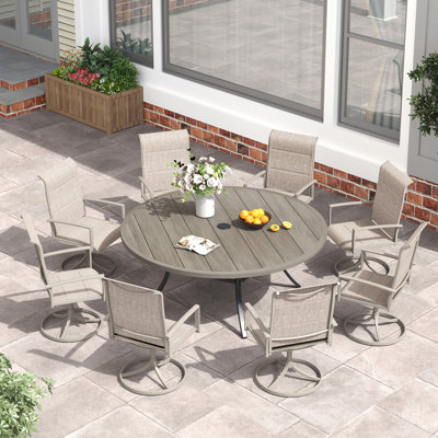 Outdoor Patio Dining Set with 8-person Round Dining Table and Padded Swivel Chairs by Wildon Home