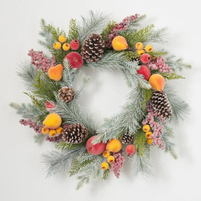 Couronne de fruits givrés - pomme sucrée, poires, baies en cage avec pin floqué et pommes de pin
