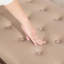 Banc de bout de lit capitonné à boutons avec appui-tête, similicuir et pieds en noyer-133348845-133348846