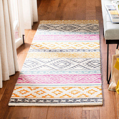 Lobdell Hand Tufted Wool/Cotton Geometric Rug in Ivory/Rust