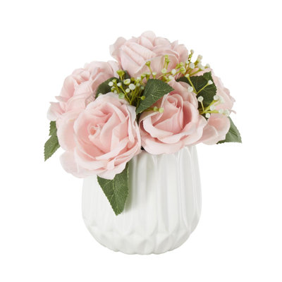 Cole et feuillage naturel en tissu gris avec feuilles vertes et vase rond en céramique