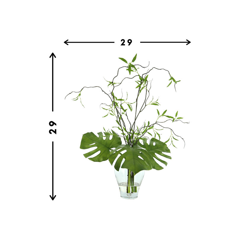 Philo Leaf And Willow Branch Arrangement In A Clear Glass Vase