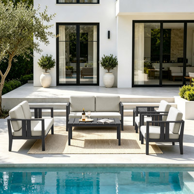 Ensemble de patio extérieur en teck Junco pour six personnes avec coussins et deux tables