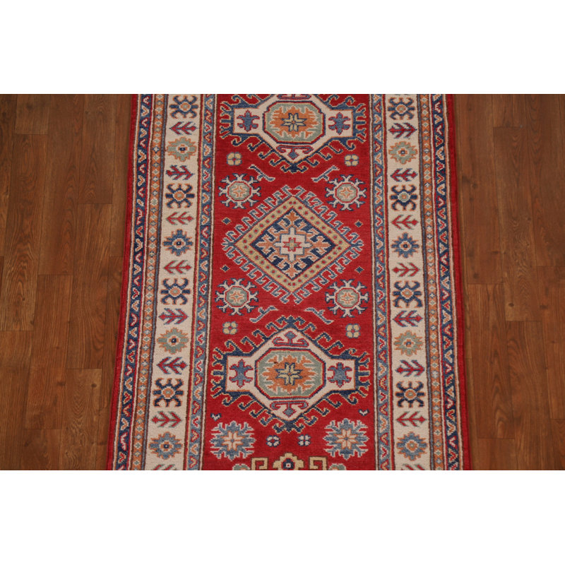 Tapis rouge à motif géométrique Kazak