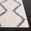 Tapis ivoire à motif géométrique-911326431