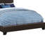 Structure de lit double en similicuir brun avec sommier tapissier pour un revêtement de chambre à coucher élégant