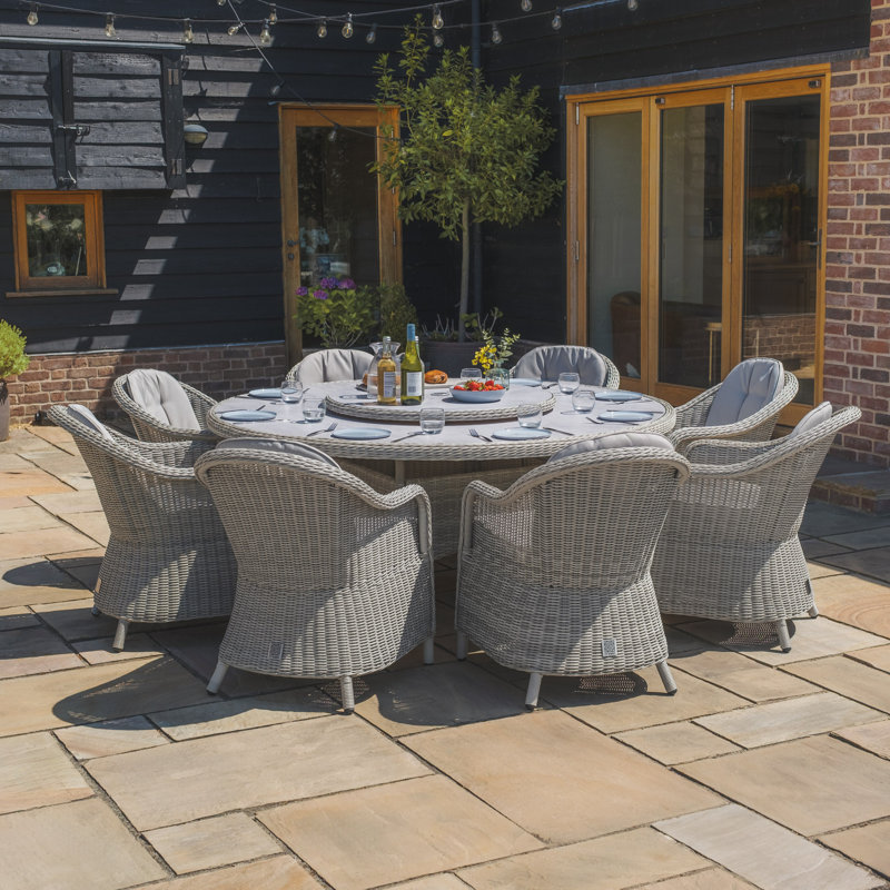 Anissah 8 - Person Patio Dining Set with Round Table