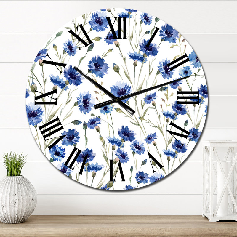 Horloge murale à fleurs bleues sur fond blanc, Petit
