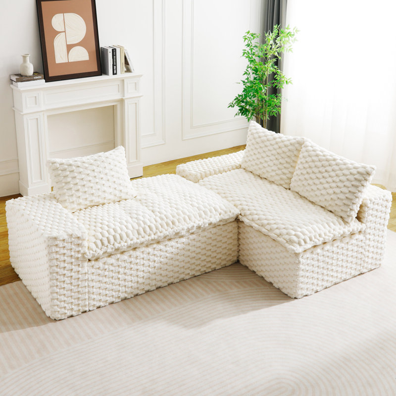 Canapé polyvalent en velours blanc tortue: méridienne convertible à deux places et à droite avec sièges en face à face, permutable entre la forme en L et la forme droite