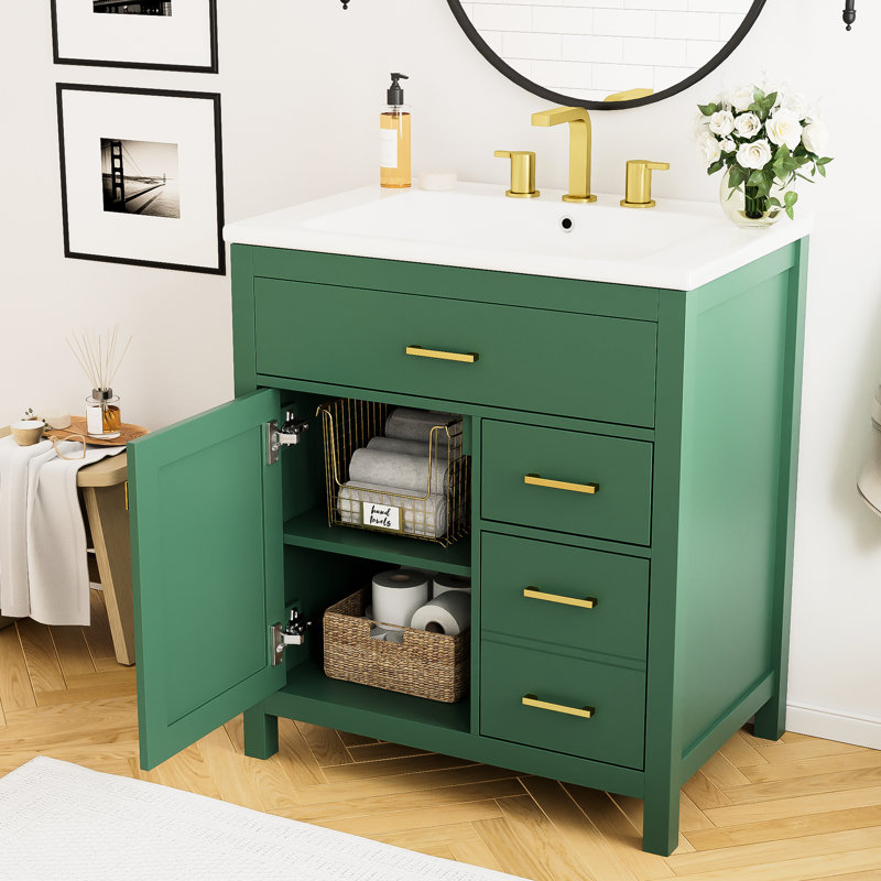 Meuble-lavabo de 30 pouces avec lavabo en céramique et nombreux espaces de rangement. L 30 po x P 18,3 po x P 33,6 po. Conception compacte pour les petites salles de bain. Longévité en bois massif créée. Abondante variété de tablettes
