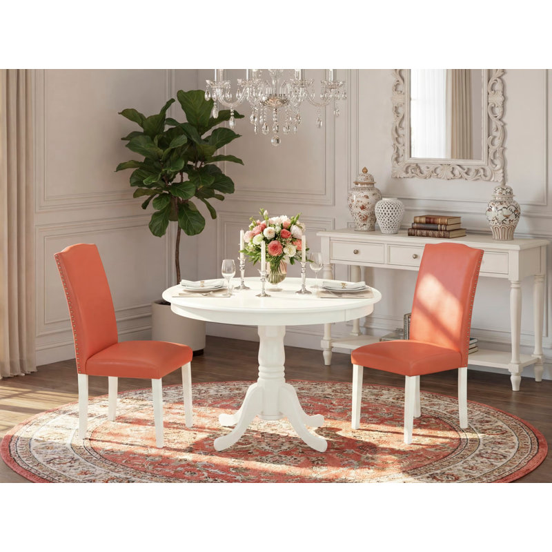 3 Piece Modern Dining Table Set Contains a Round Wooden Table with Pedestal and 2 Pink Flamingo Faux Leather Upholstered Chairs, Linen White