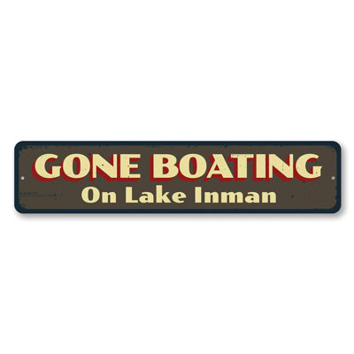 Plaque en métal «Gone Boating»
