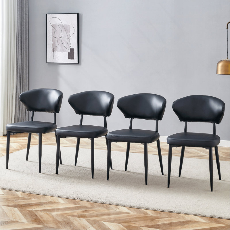 La chaise de salle à manger minimaliste et ergonomique, avec un dossier incurvé pour une conception confortable, libère une nouvelle position assise confortable et minimaliste. Un paquet de 4.