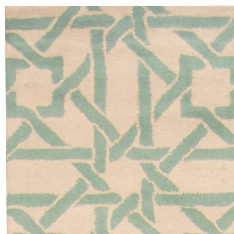 Tapis ivoire / bleu sarcelle touffeté à la main