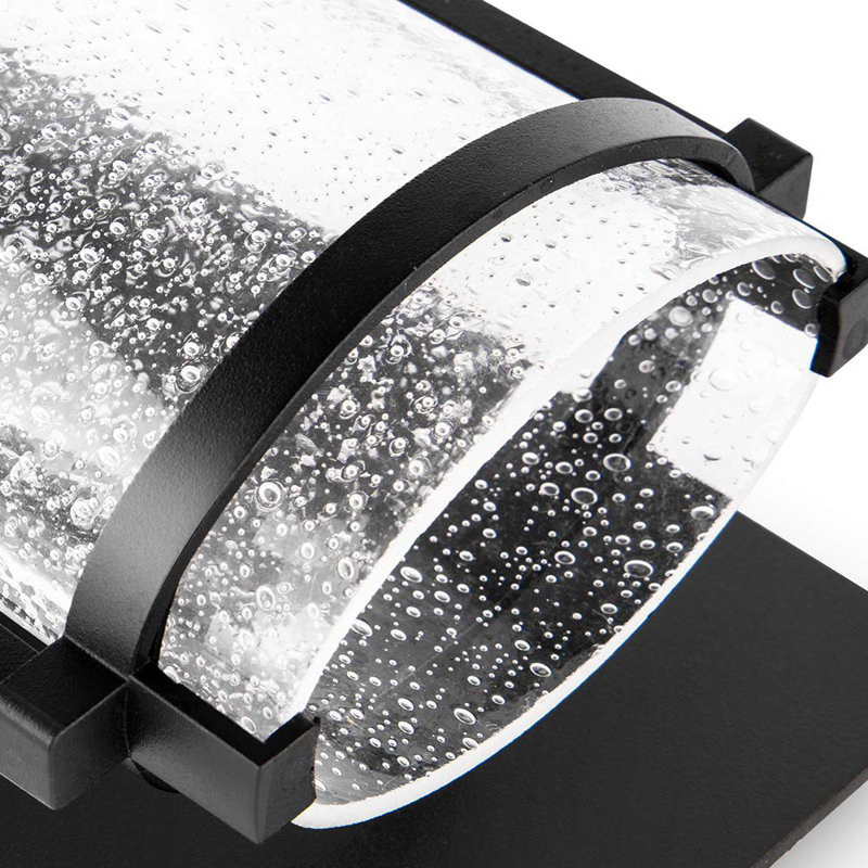 Matte Black Cylinder LED Wall Sconce with Seeded Glass