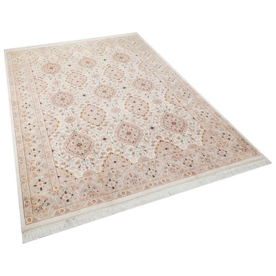 Tapis oriental turc rose en laine noué à la main
