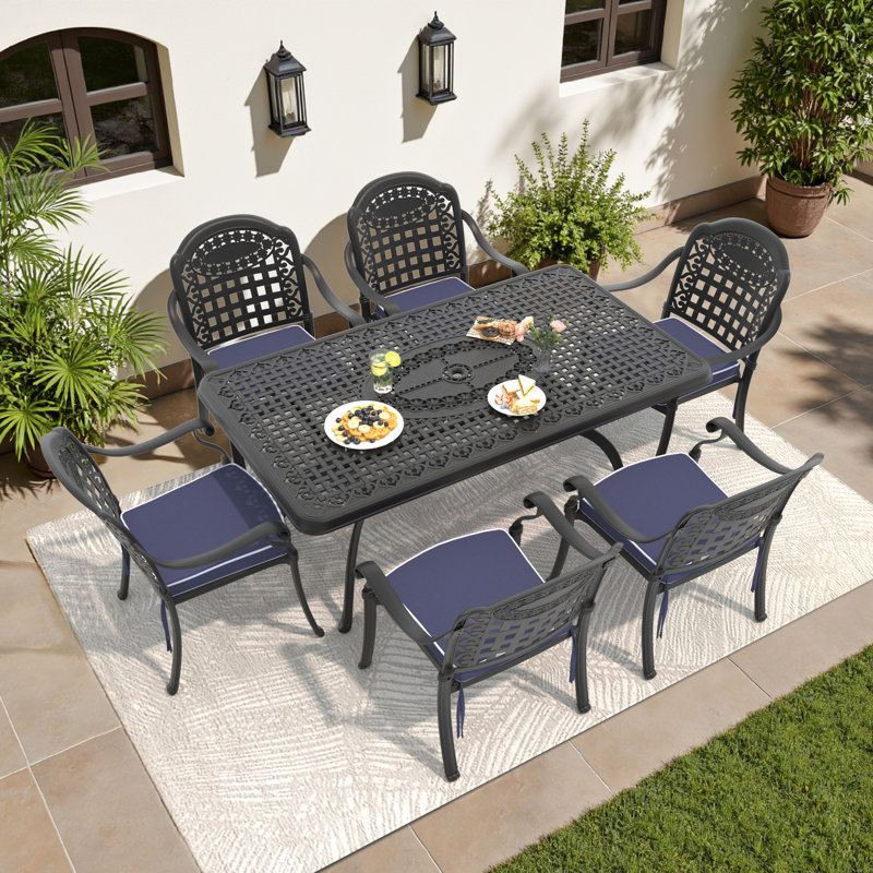 Shannda 7-Piece Cast Aluminum Patio Dining Set with 68.9" Rectangular Table, Umbrella Hole & Blue Cushions