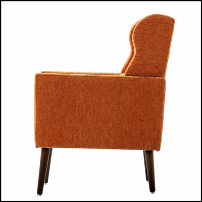 Fauteuil rembourré confortable pour différentes pièces, favorisant la détente et ajoutant une touche de luxe