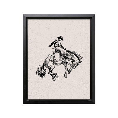 Cowboy chevauchant un cheval sauvage