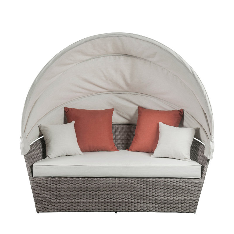 Canapé de patio avec 4 coussins et repose-pieds Conant