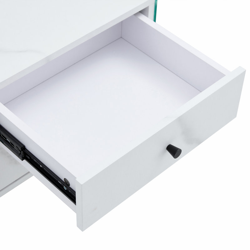 Double-Drawer Bedside Table. The Board Surface Is MDF With Wood Grain Sticker, And Both Sides Are Transparent Tempered Glass. The Design Is Simple And Elegant, With Excellent Storage Functions.