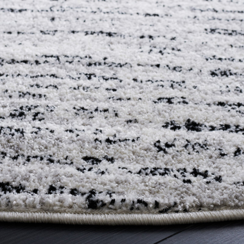 Riebe Abstract Ivory/Silver Area Rug, Round 6'