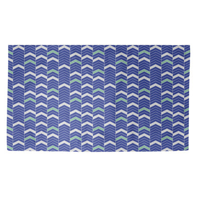 Tapis bleu à motif de rayures à chevrons Stephenie