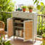Buffet vert menthe avec panneaux en rotin