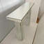 Console moderne à miroir avec rangement ouvert et design rectangulaire